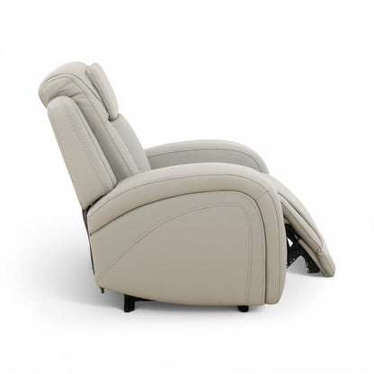 Beige power recliner chair reclined side view with visible footrest support hardware