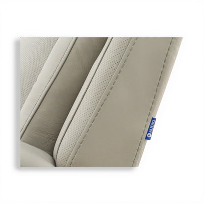 Light beige faux leather upholstery with perforated insert and blue brand label