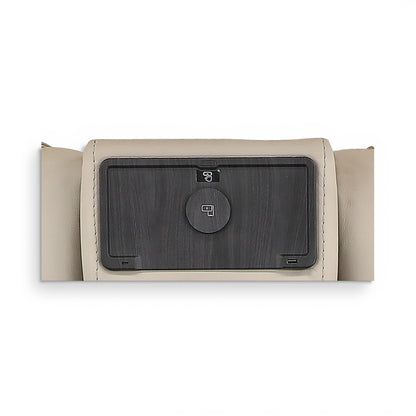 Reclining console panel with dark screen and circular icon, framed in light beige