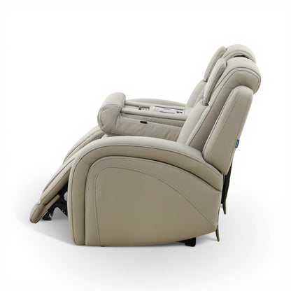 Beige leather power reclining sofa with wide seat, side console, and reclining base