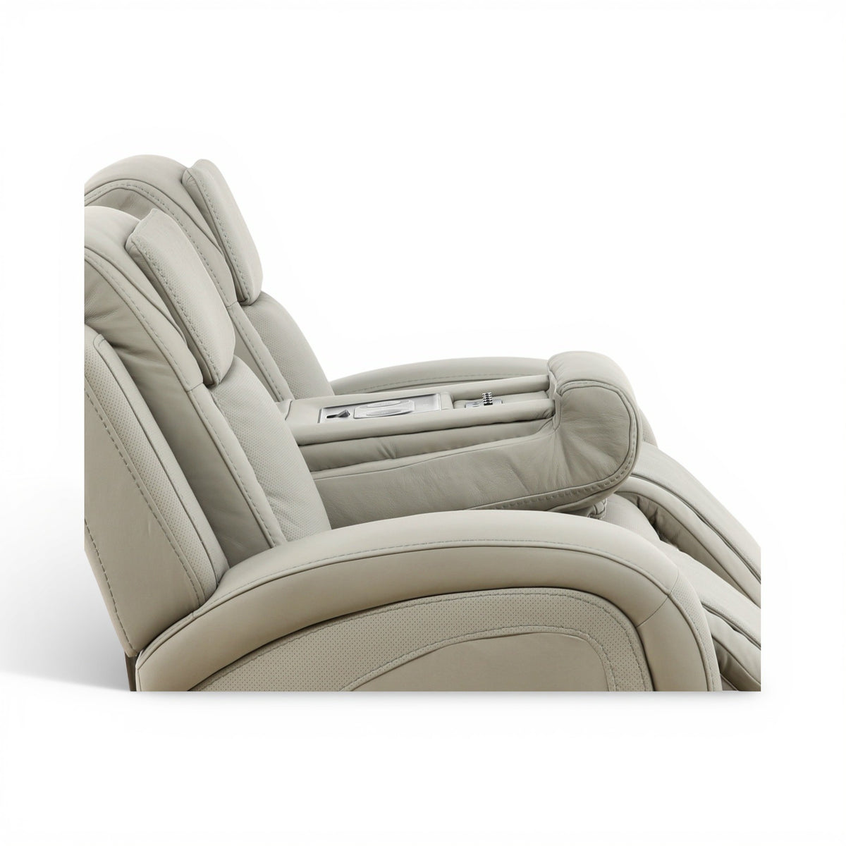 Beige leather power reclining sofa backrest with arm panel and segmented cushioning