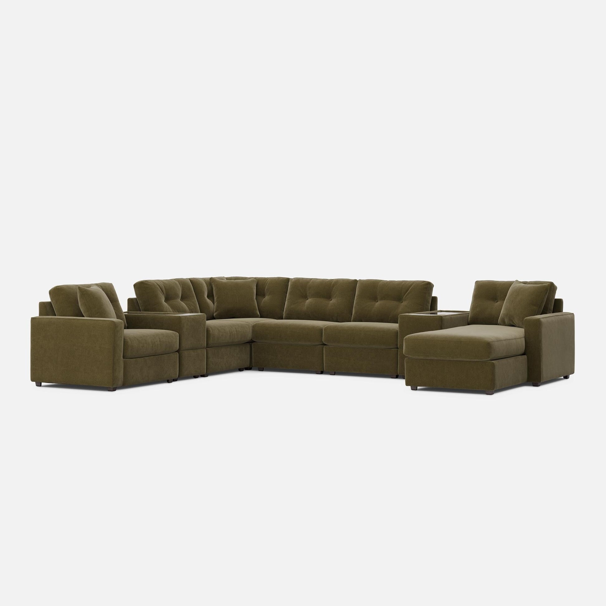 Moss green modular sectional sofa with curved corner and chaise chaise section