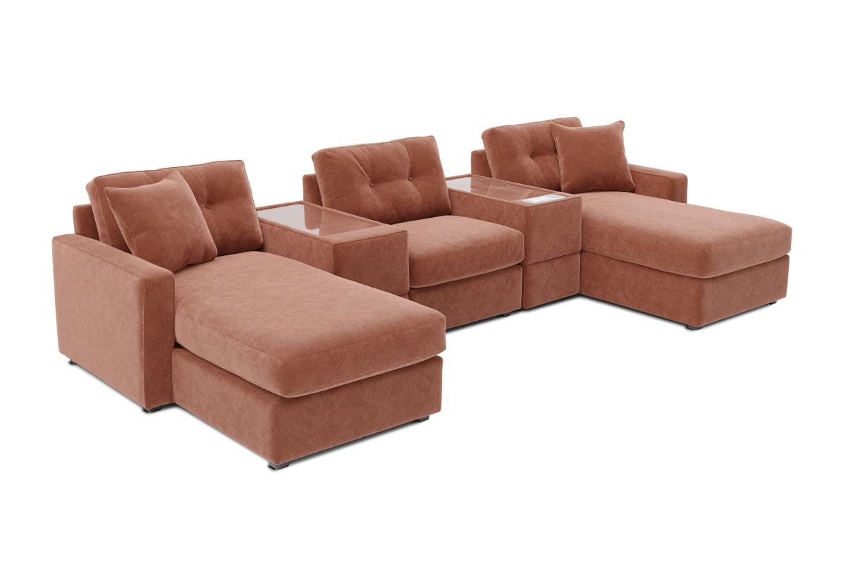 Terracotta L-shaped theater sectional with two chaise seats and tufted back pillows.