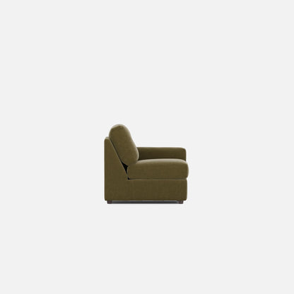 Olive modular lounge chair side view with tall back cushion and padded armrest