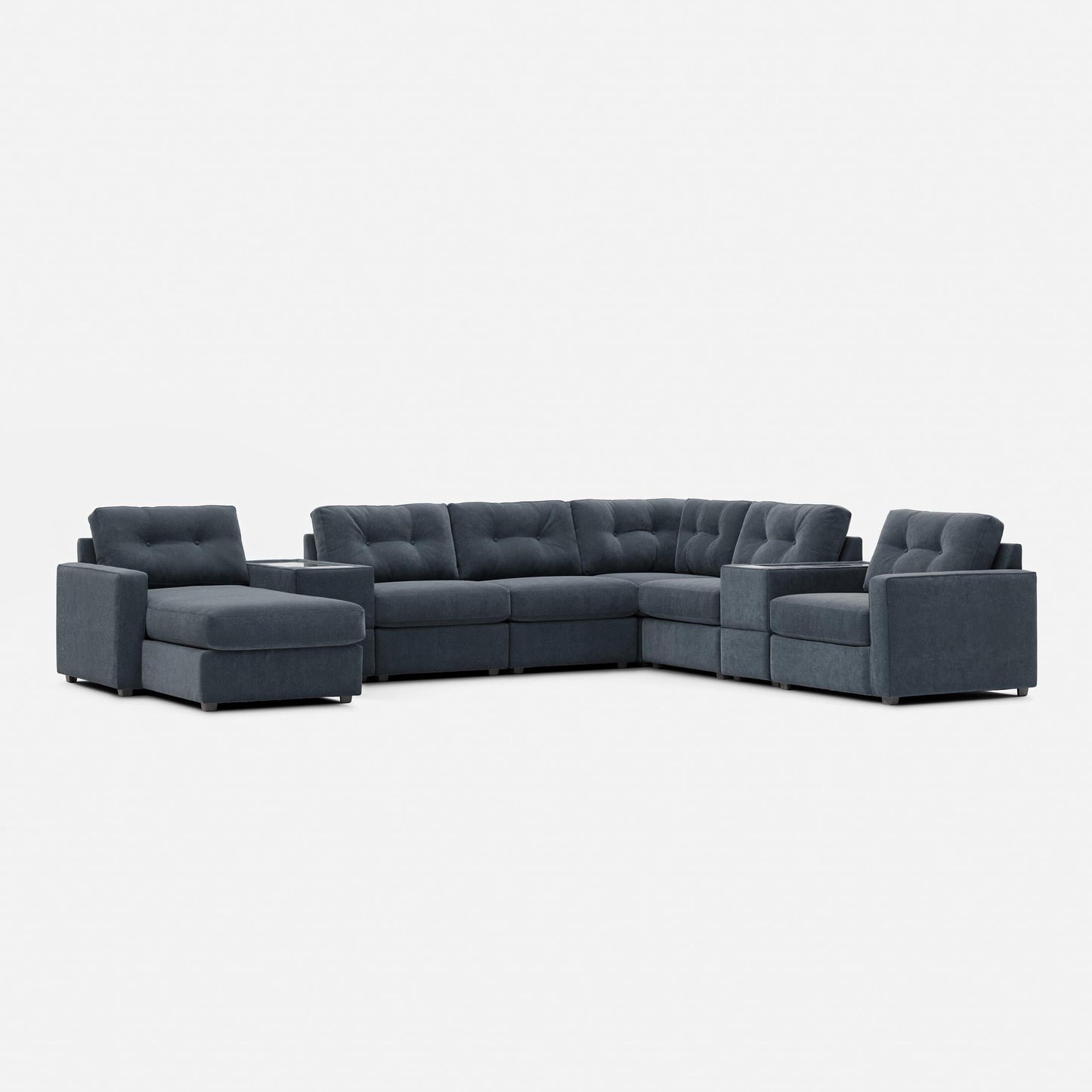 Dark gray modular sectional sofa with tufted back and chaise corner