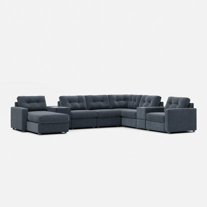 Dark gray modular sectional sofa with tufted back and chaise corner
