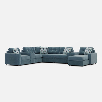 Teal modular sectional sofa with chaise sections and accent pillows