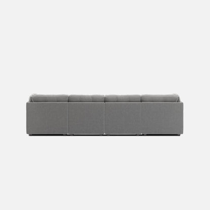 Light gray 6-piece modular sectional sofa with boxy armrests and tufted cushions