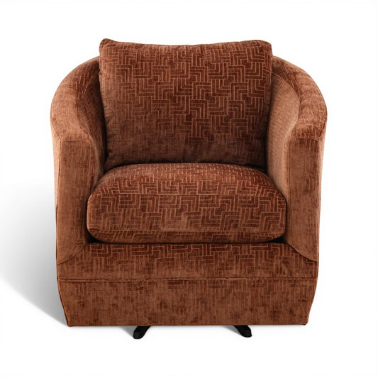 Brown upholstered accent chair with patterned back and seat cushions, block feet