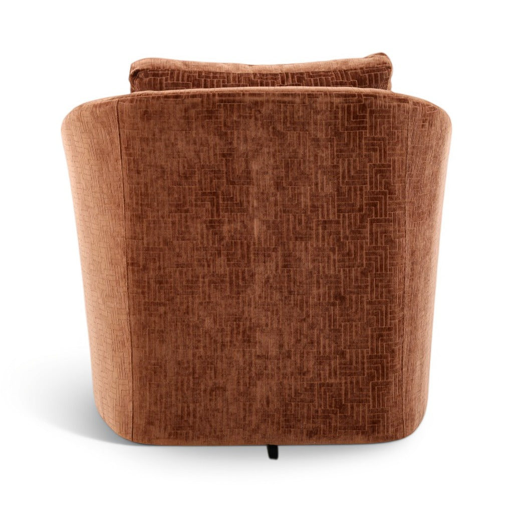 Back view of brown upholstered accent chair with curved arms and patterned headrest