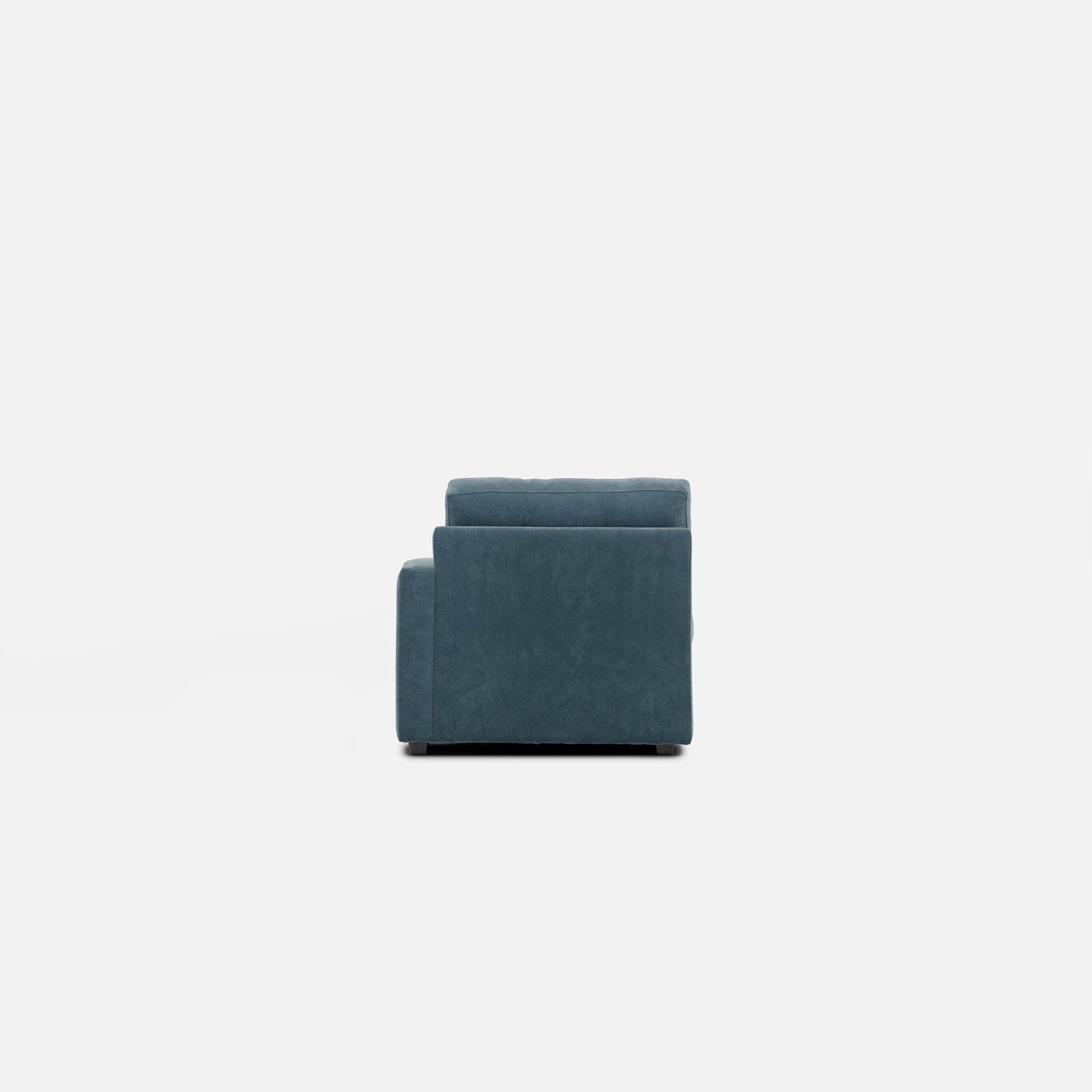 Upholstered chaise lounge module with tall tufted back in teal-blue fabric