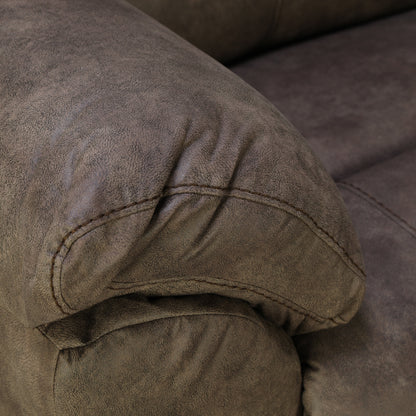 Dark brown loveseat armrest and seat seam with curved stitching detail