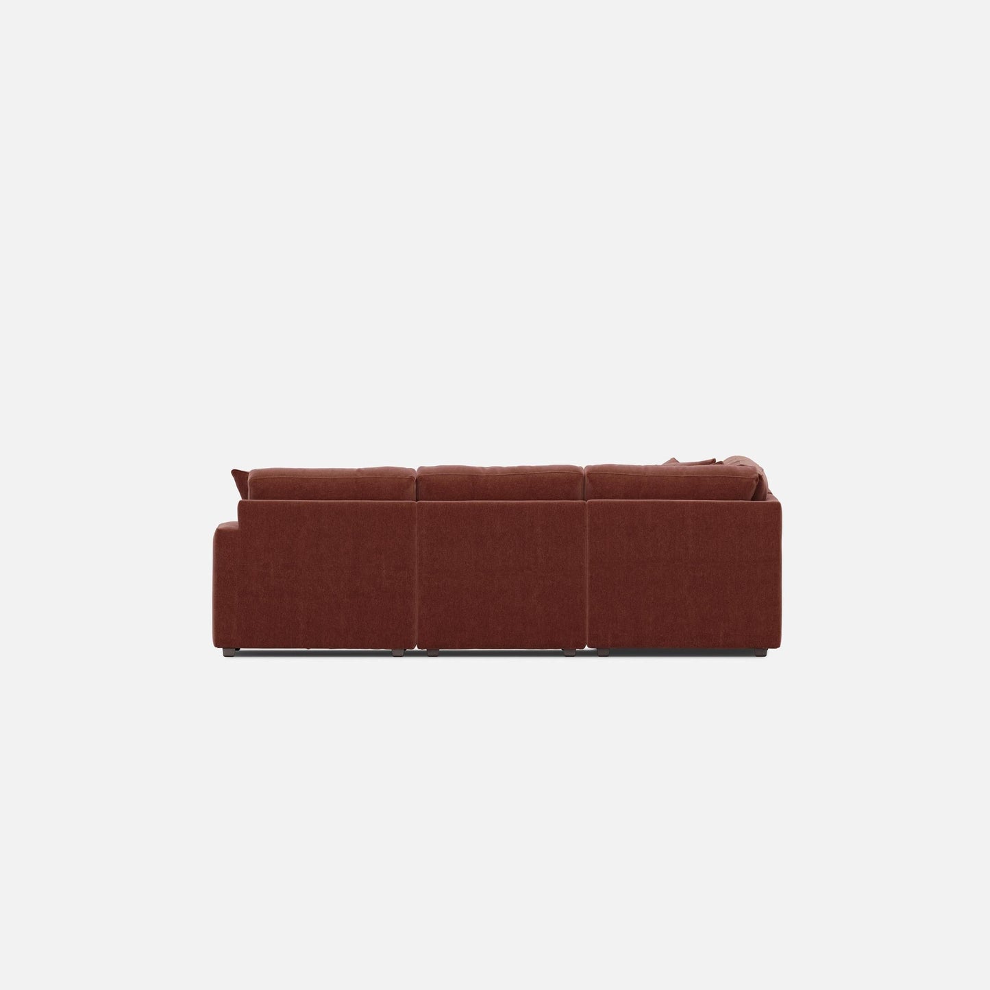 Merlot red sectional sofa with straight seating, tufted back panels and padded arms