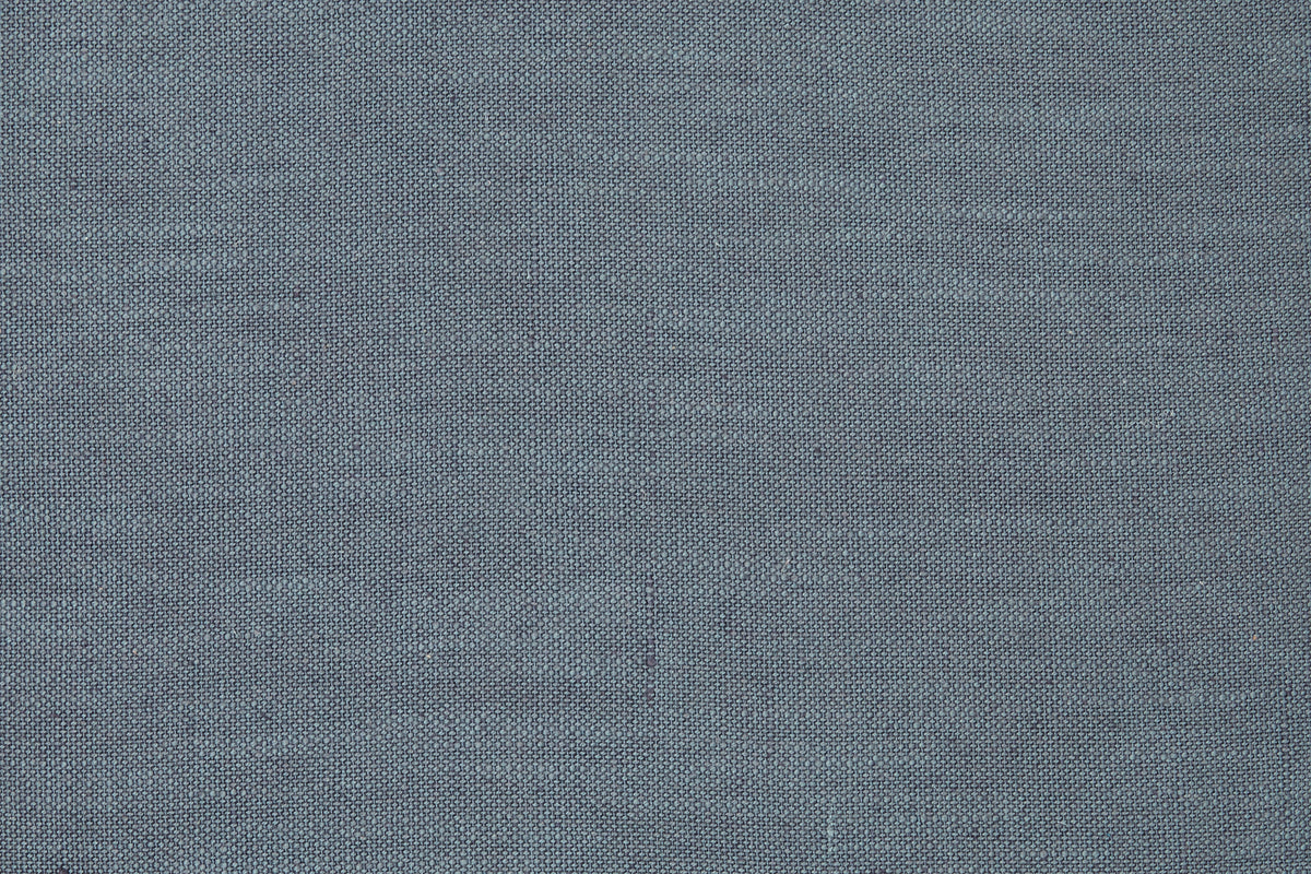 Close-up of blue woven fabric texture for a throw pillow
