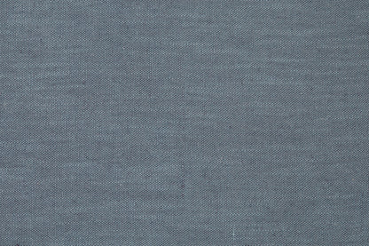 Close-up of blue woven fabric texture for a throw pillow