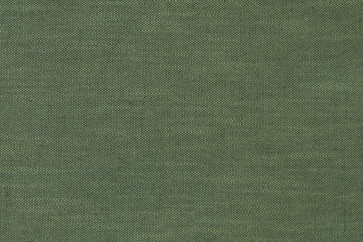Close-up of green woven fabric texture for a throw pillow