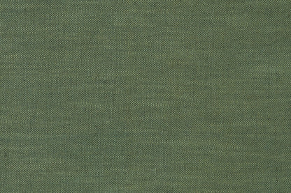 Close-up of green woven fabric texture for a throw pillow