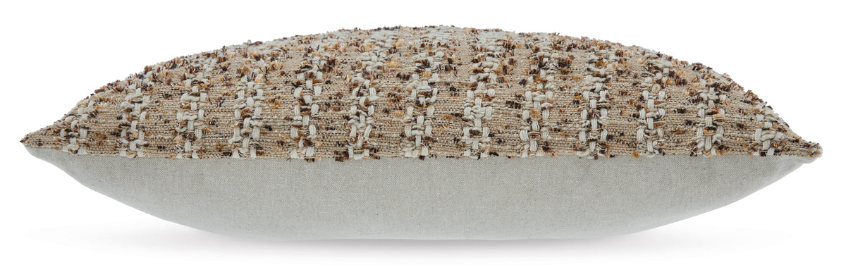 Beige woven decorative pillow showing side seam and flat edge profile
