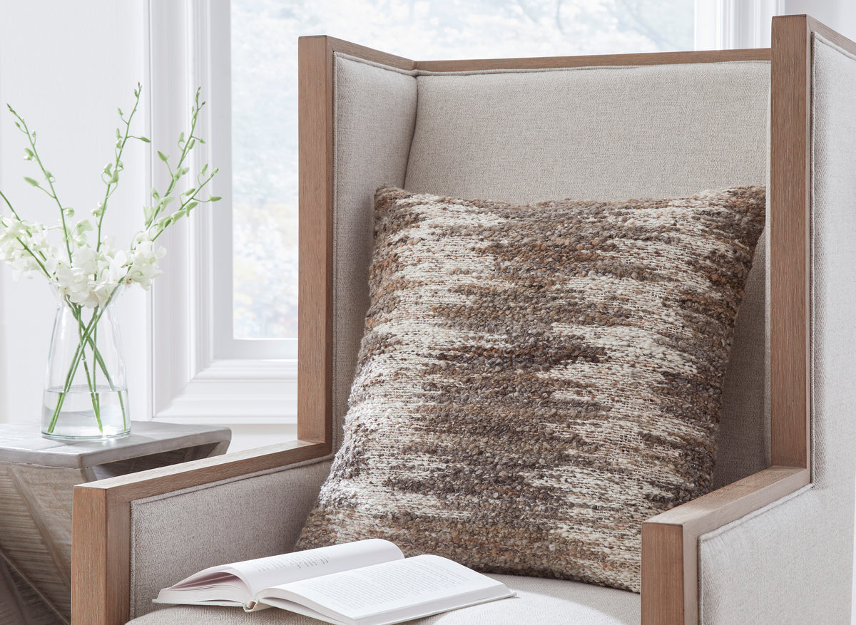 Ashley Nealton throw pillow with woven brown, tan, and gray striped texture