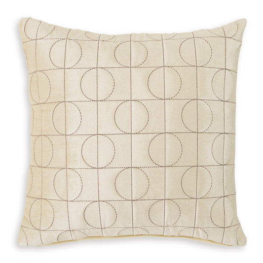 Beige square pillow with stitched grid and circular ring motif