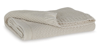 Folded sand knit throw blanket with ribbed texture