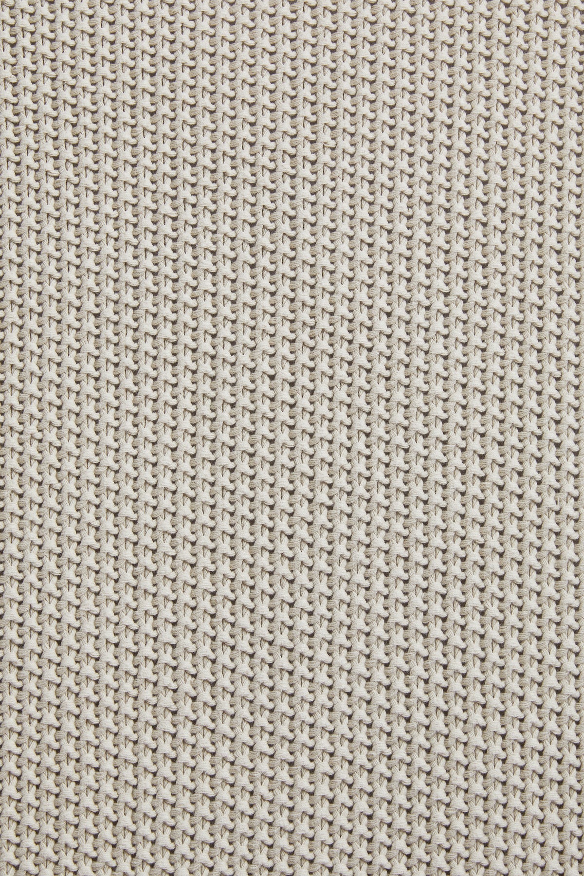 Sand knit throw blanket fabric close-up, textured vertical stitch pattern