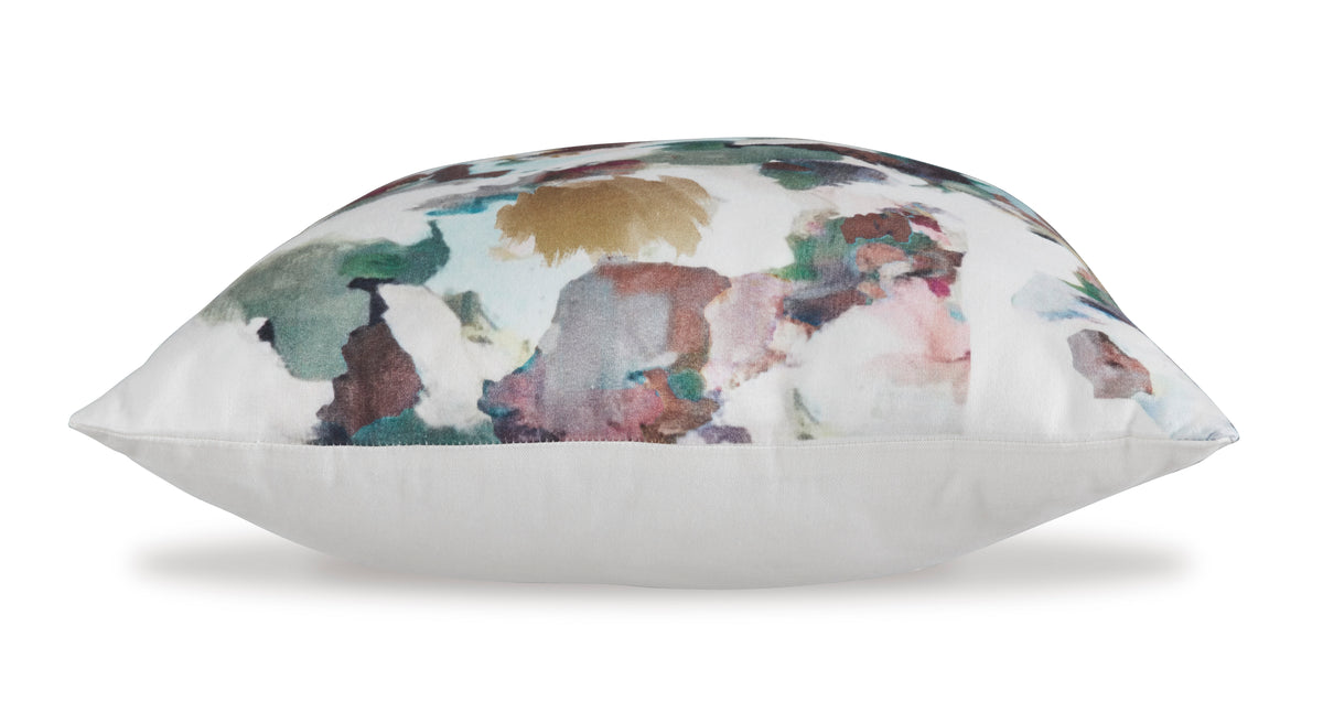 Side view of a square throw pillow with multicolor abstract watercolor print