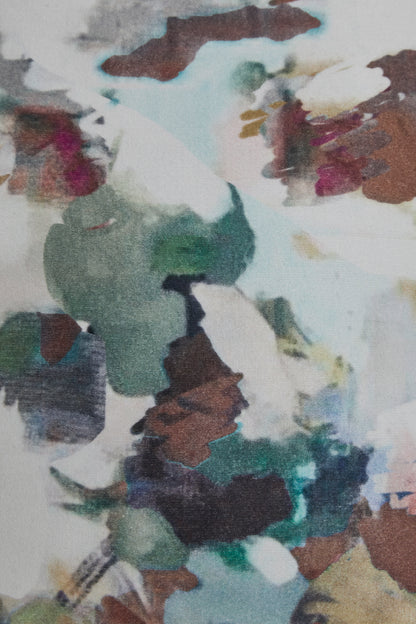 Close-up of multicolor abstract watercolor print pillow fabric