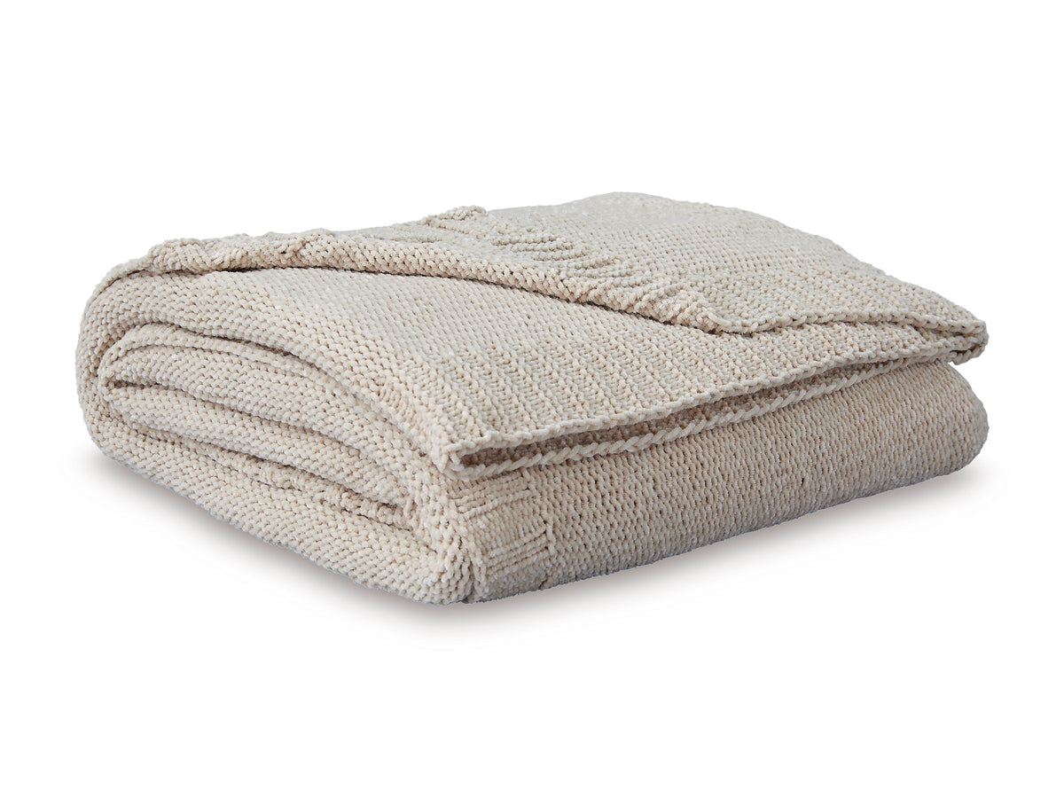 Oatmeal woven throw blanket folded with textured surface
