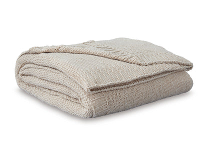 Oatmeal woven throw blanket folded with textured surface