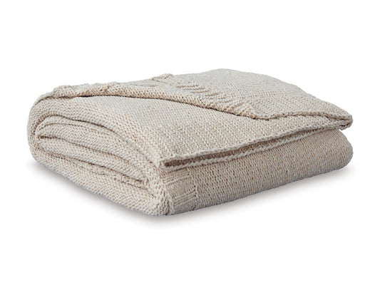 Oatmeal woven throw blanket folded with textured surface
