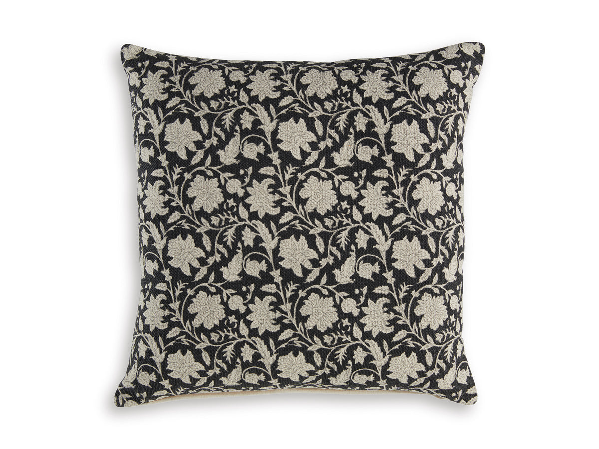 Square decorative pillow with black fabric and beige floral vine pattern