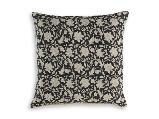 Square decorative pillow with black fabric and beige floral vine pattern