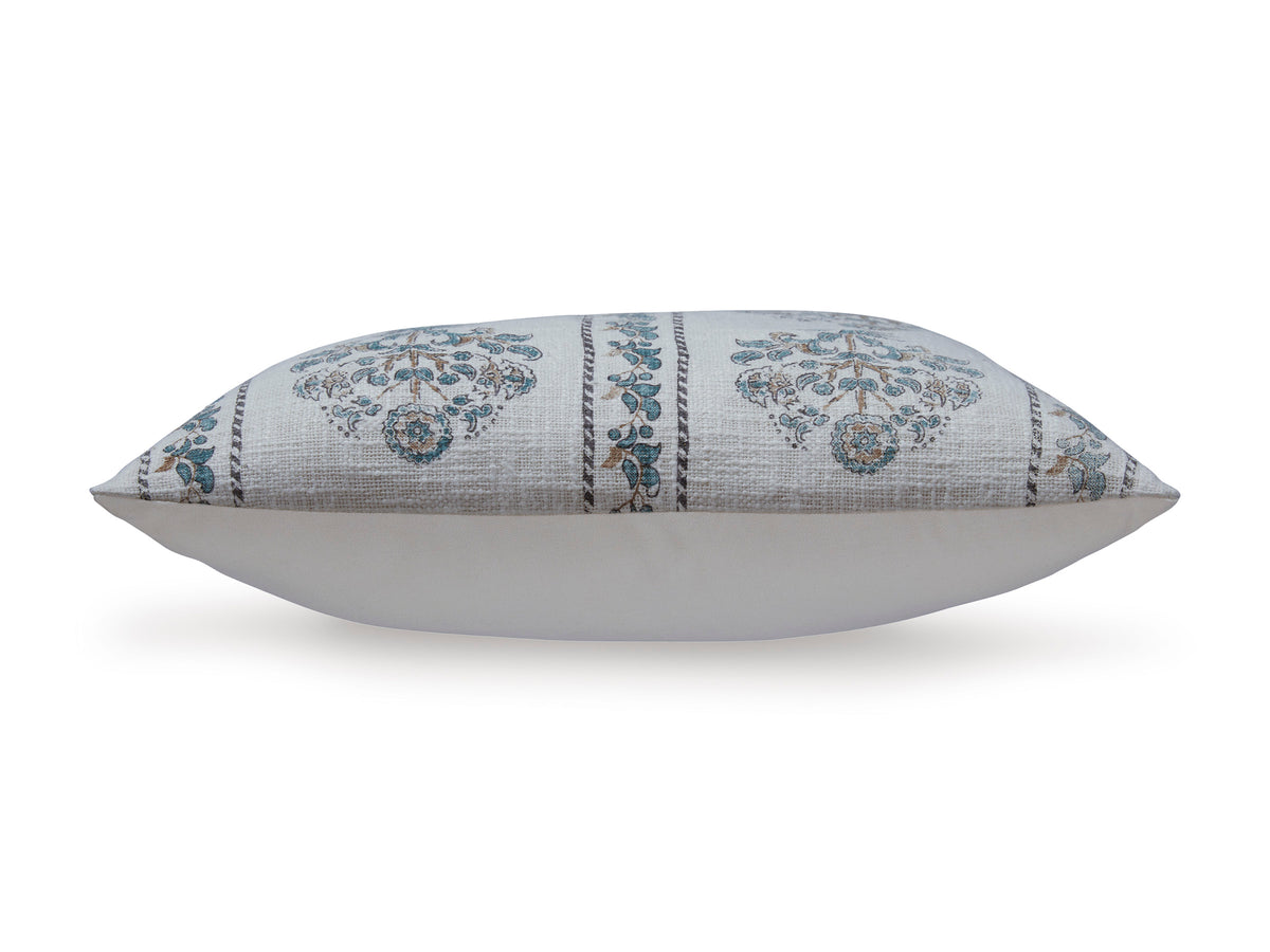 Decorative lumbar pillow in white with blue ornamental stripes and border
