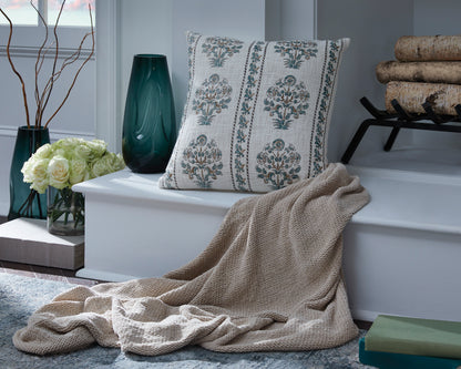 Ashley Paulmour pillow with white fabric and blue ornamental medallion pattern