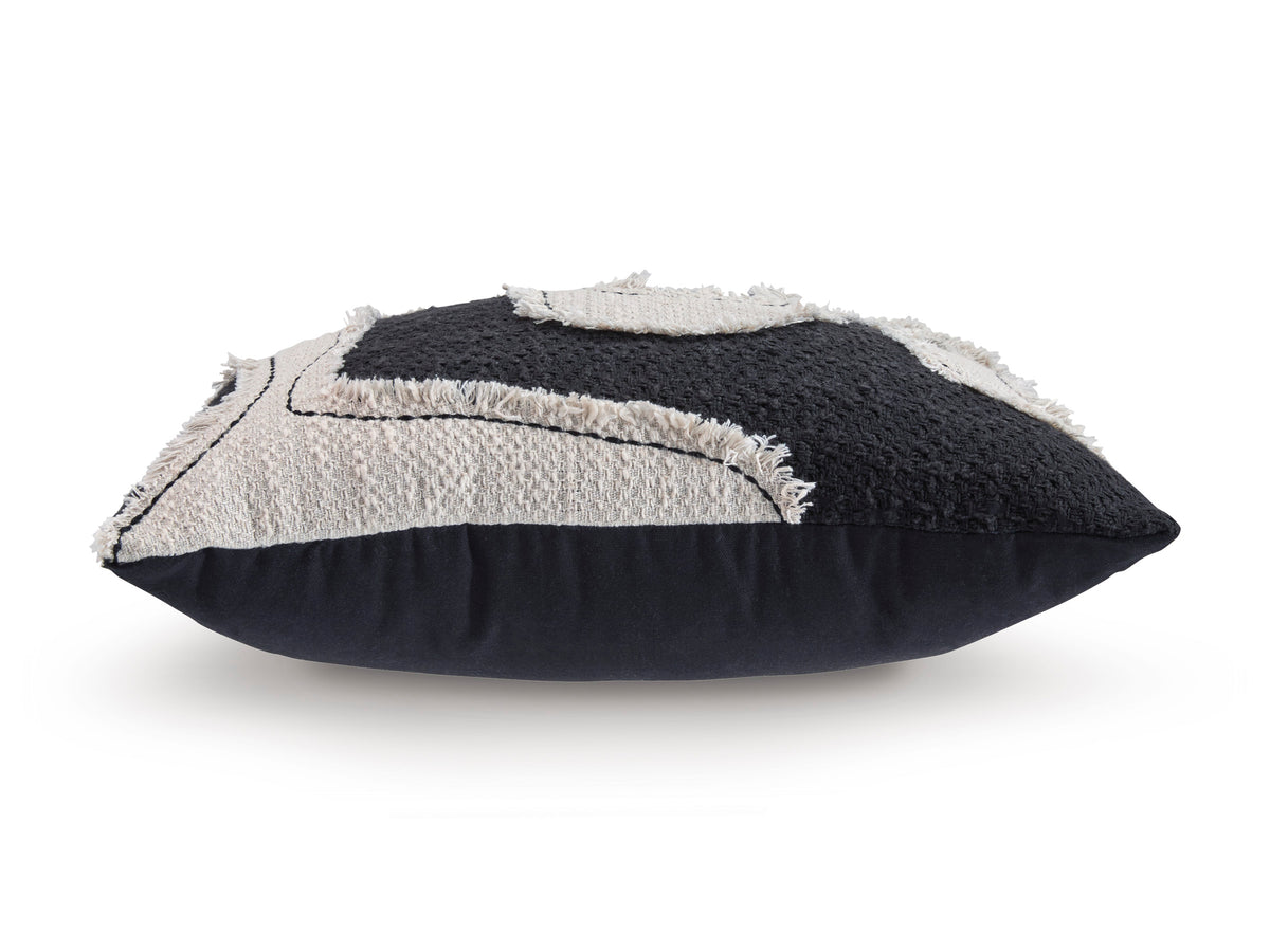 Black and cream lumbar throw pillow with stitched geometric pattern