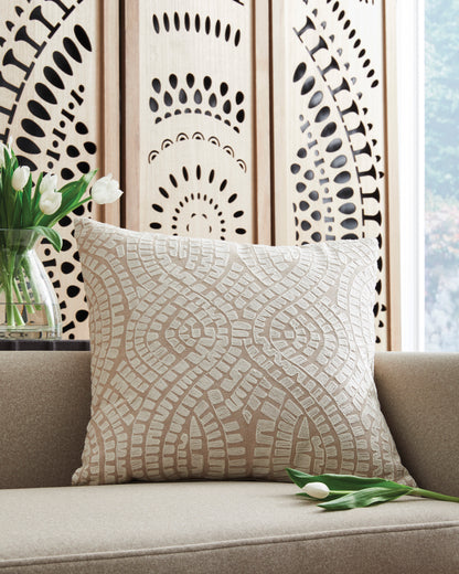 Decorative throw pillow with beige and white textured geometric pattern