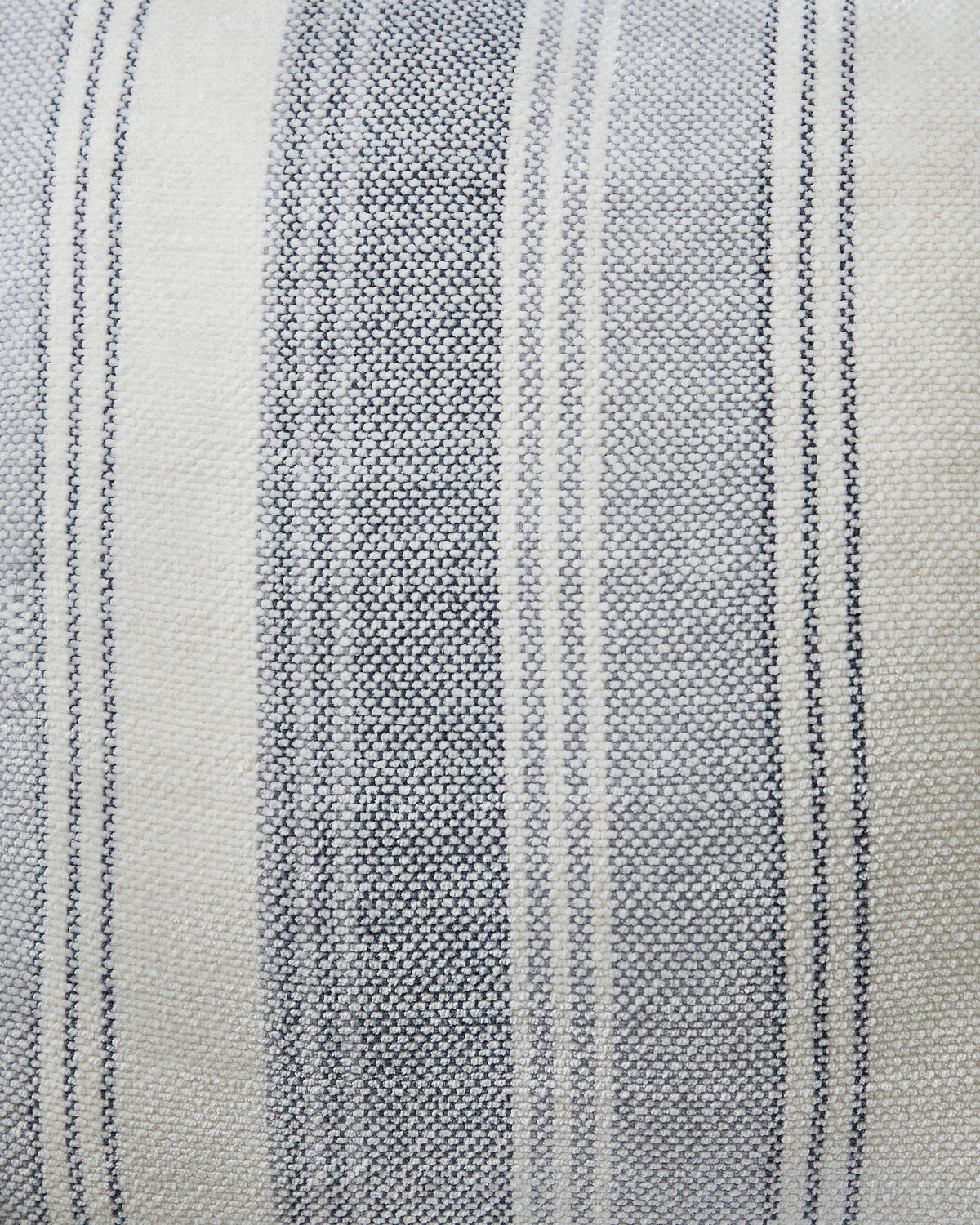 Woven fabric closeup with vertical light gray and white stripes