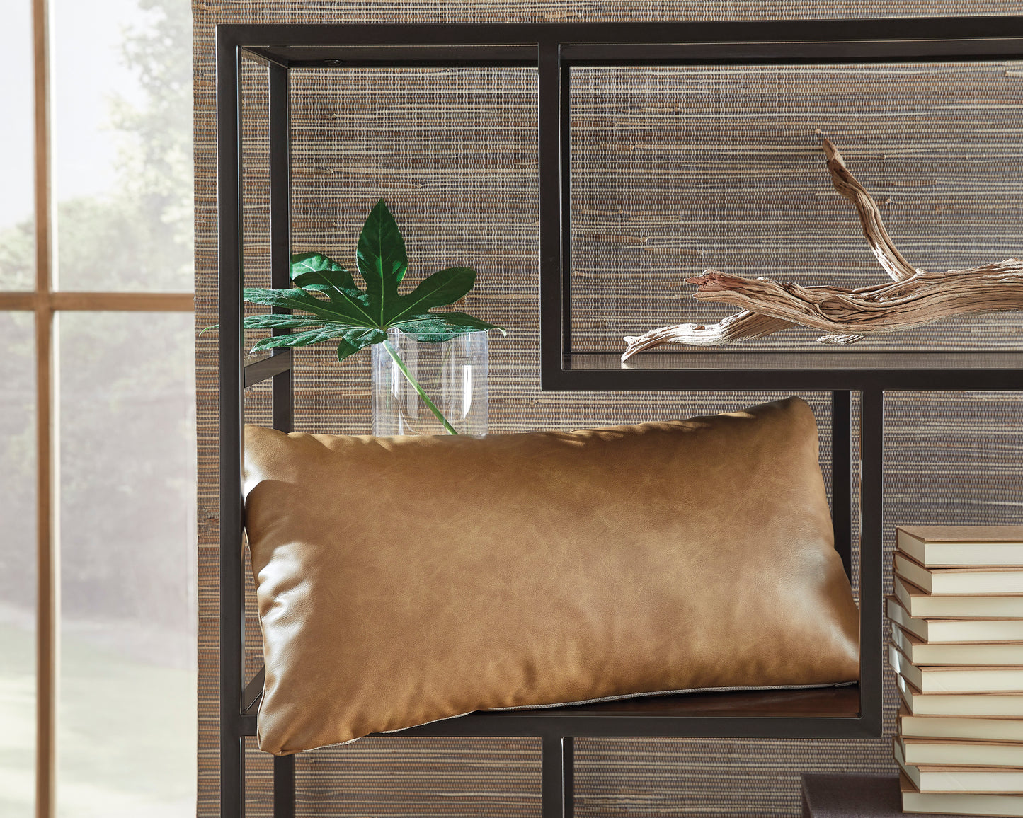 Suede-look rectangular pillow in caramel tan on chair frame