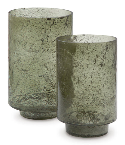 Set of 2 green speckled glass candle holders with wide rims and open tops.