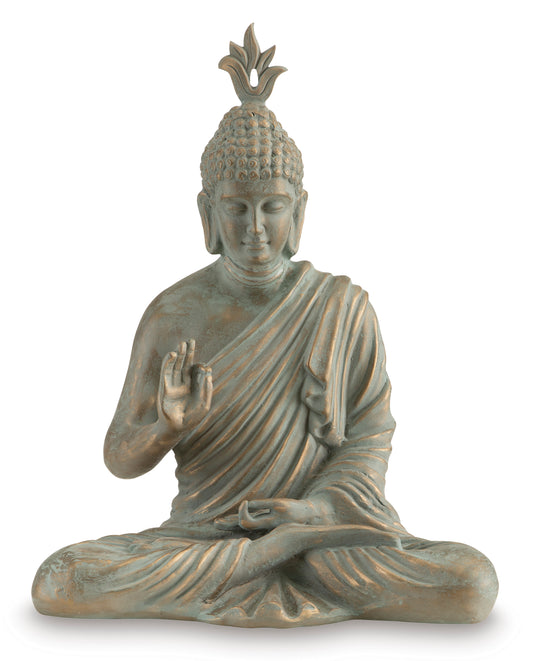 Seated Buddha sculpture facing forward with raised blessing hand
