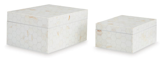 Set of two lidded storage boxes in cream with subtle hexagon pattern