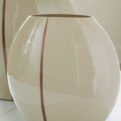 Ashley Sheabourne vase close-up, glossy cream surface with vertical rust stripe across face.
