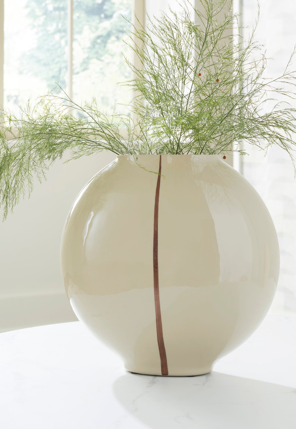 Ashley Sheabourne vase, cream ceramic with vertical rust stripe and rounded bulb profile.