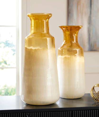 Ceramic vase with amber top glaze and cream-to-gray body, wide neck and flared rim.