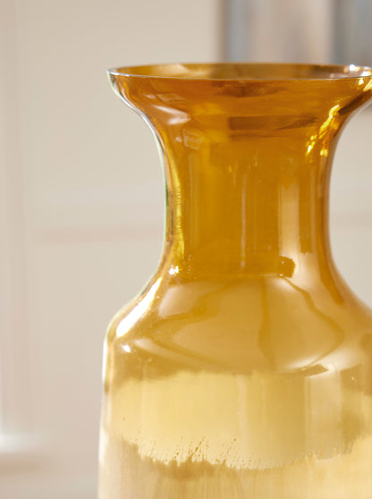 Close-up of vase rim and neck with glossy amber glaze and creamy ombre below.
