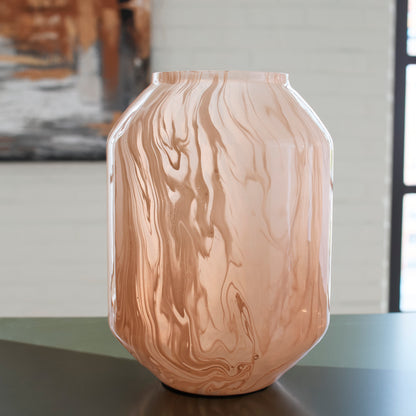 Peach glass vase with vertical wave pattern and flared rim