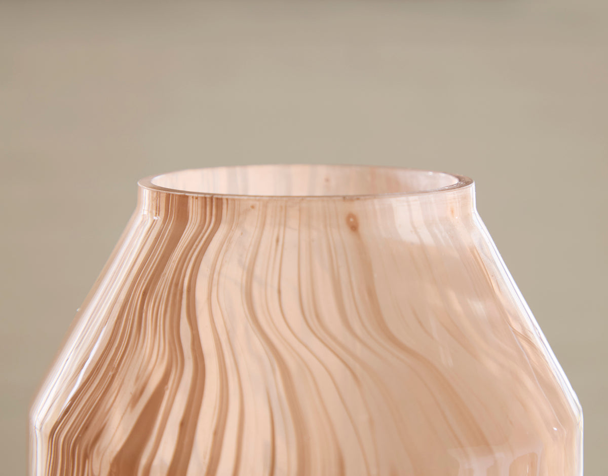 Peach glass vase rim with flared opening and vertical striations