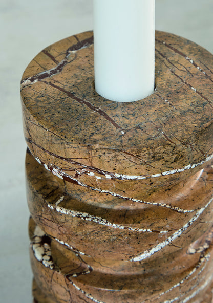 Marble-effect round candle holder with top opening for a pillar candle