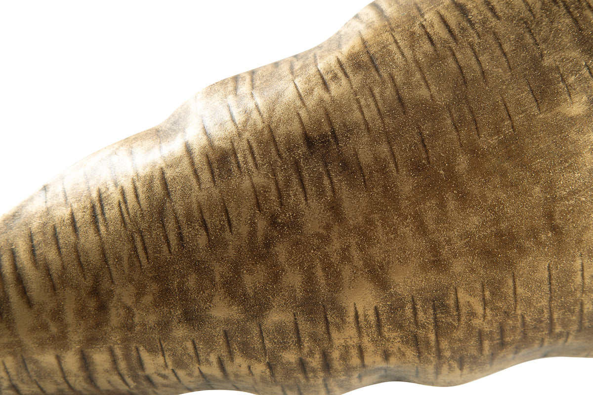 Textured golden-brown wood tray with carved leaf ridges along the rim